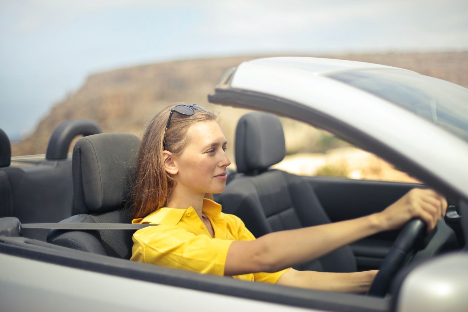 Girl Driving a Car