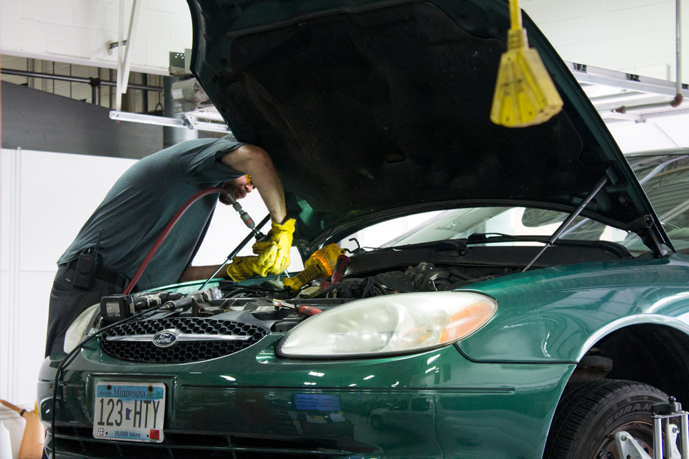 Man working on car